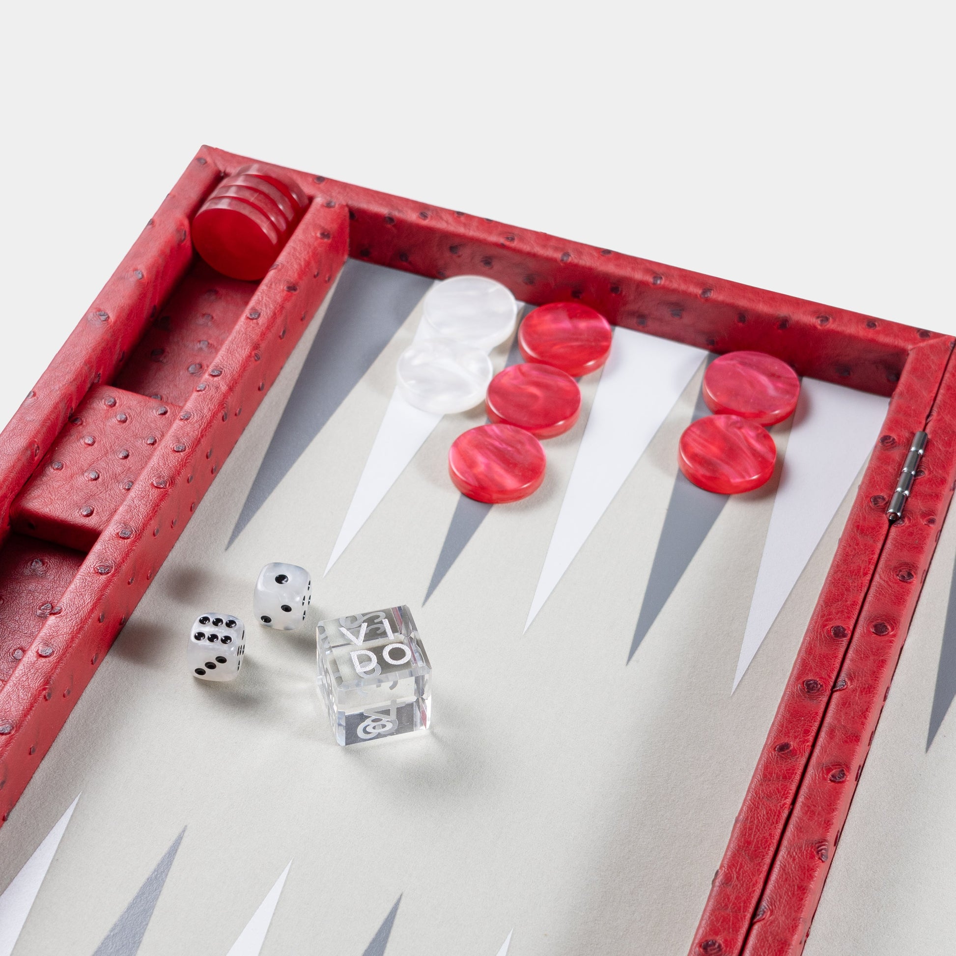 Backgammon board with red and white pieces and dice on a white background by VIDO