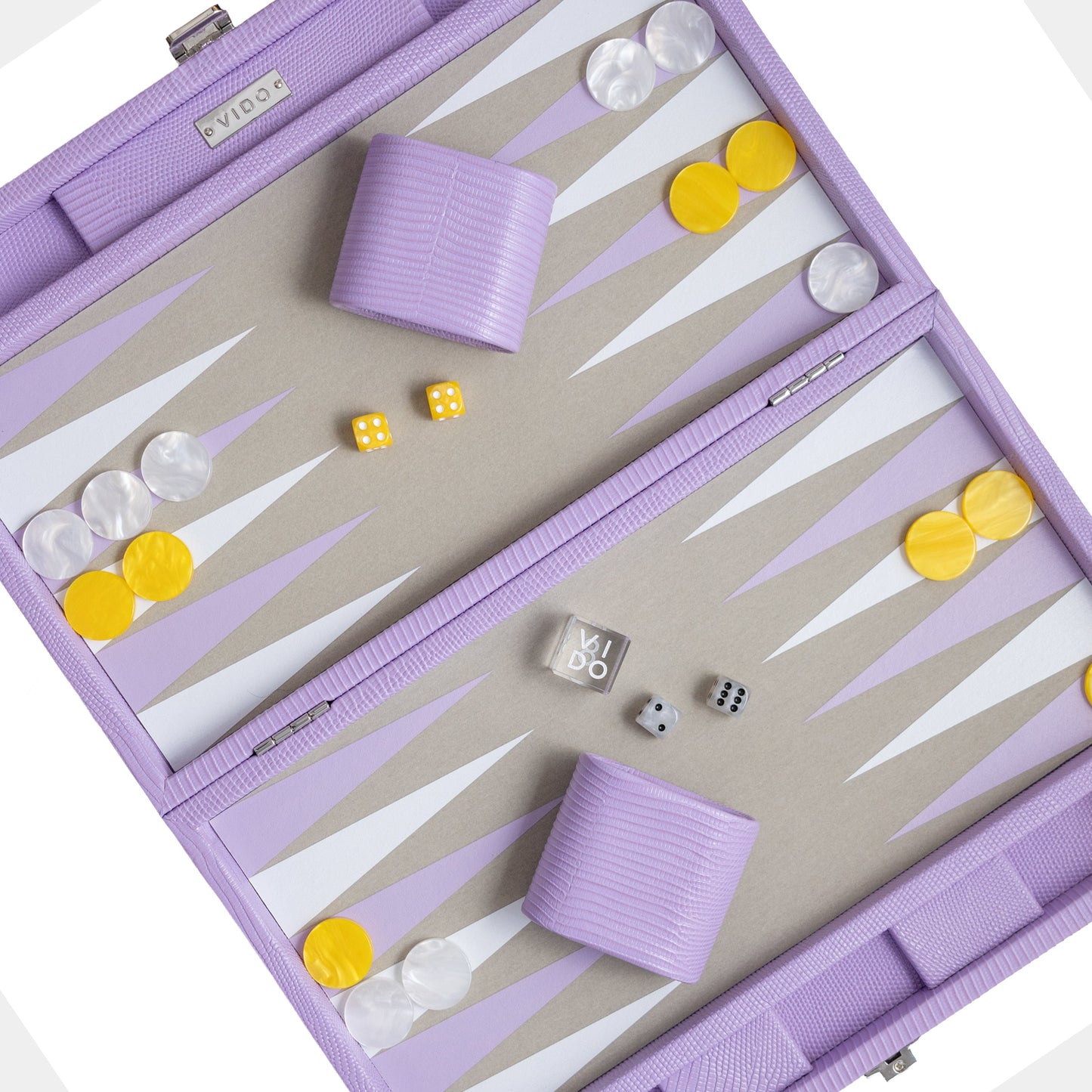 Backgammon set with purple board and yellow pieces on a white background by VIDO